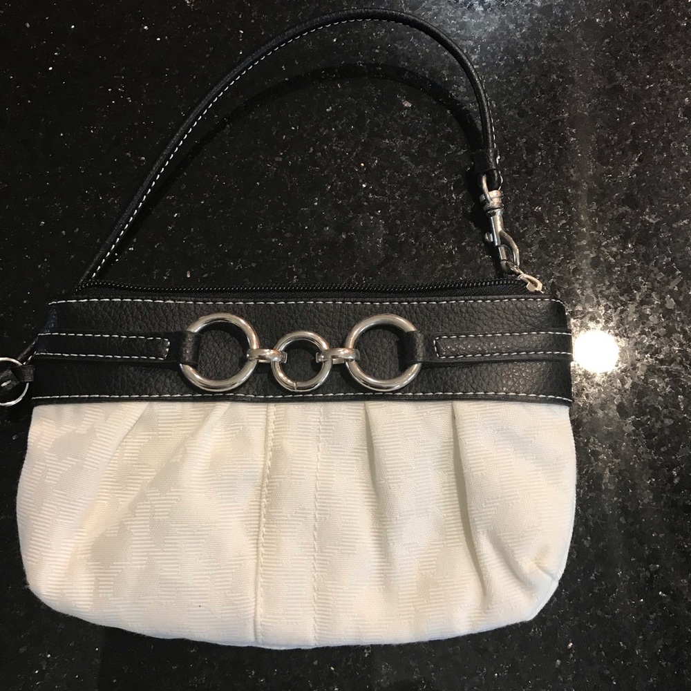 A small wristlet made by New York and Company